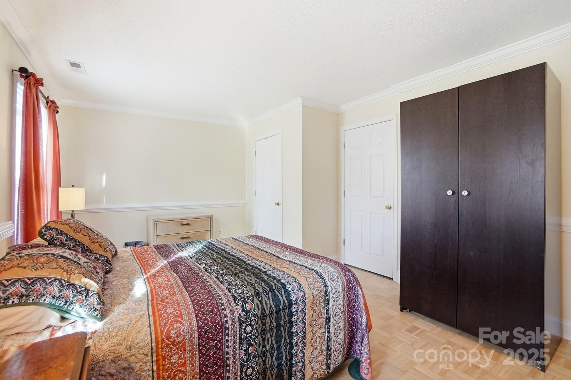 6309 Pineburr Road Charlotte, NC 28211 - Photo 22 of 46 a bedroom with a bed and a window