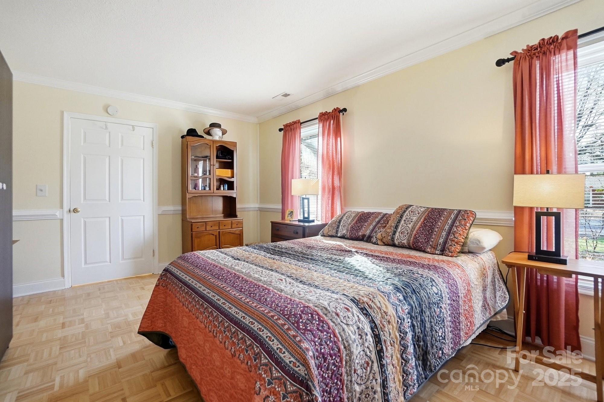 6309 Pineburr Road Charlotte, NC 28211 - Photo 23 of 46 a bedroom with a large bed and a closet