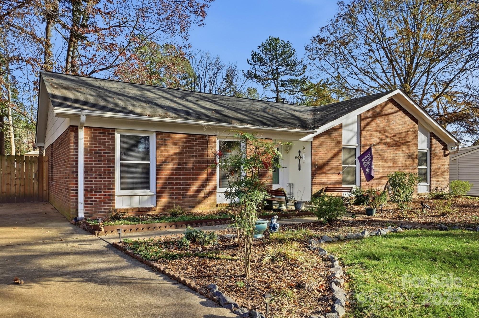 6309 Pineburr Road Charlotte, NC 28211 - Photo 34 of 46 a view of a house with a yard
