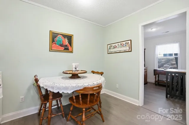 a kitchen with stainless steel appliances granite countertop a stove and a refrigerator