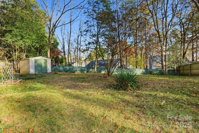 a view of backyard with outdoor space