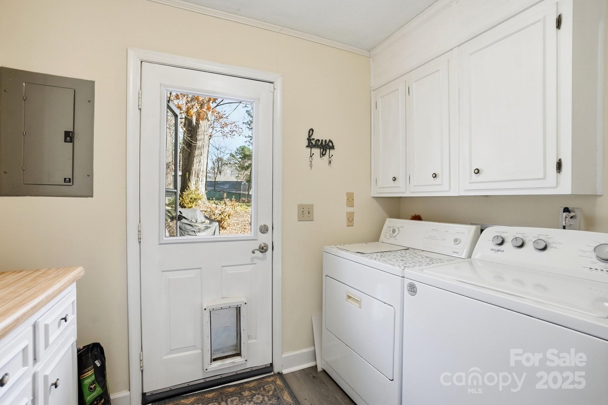6309 Pineburr Road Charlotte, NC 28211 - Photo 8 of 46 a view of utility room with washer and dryer