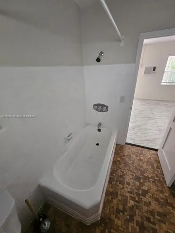 view of a room with racks on the wall