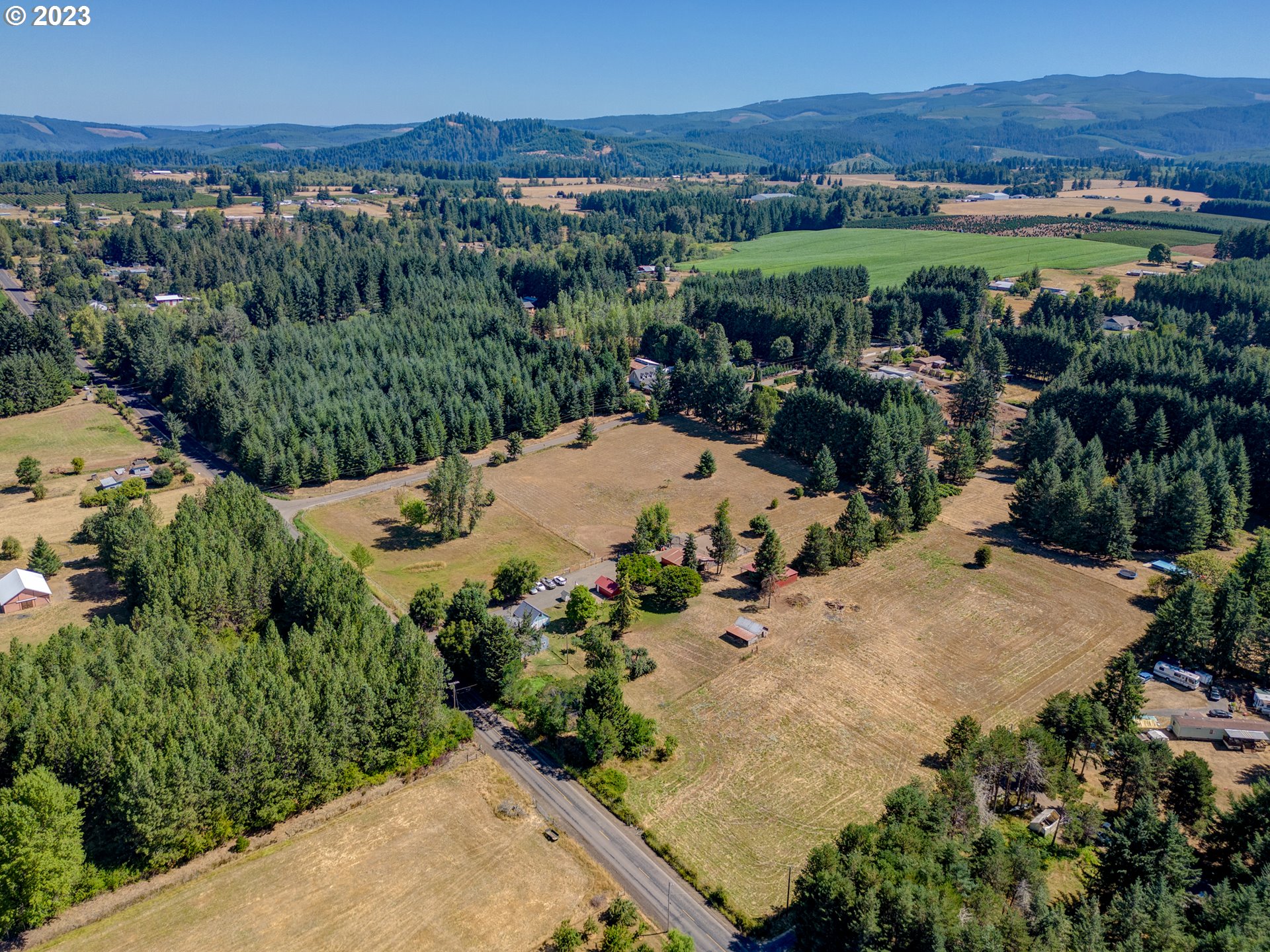 33955 Ford Mill Road Lebanon, OR 97355 - Photo 4 of 44 an aerial view of a house with a garden