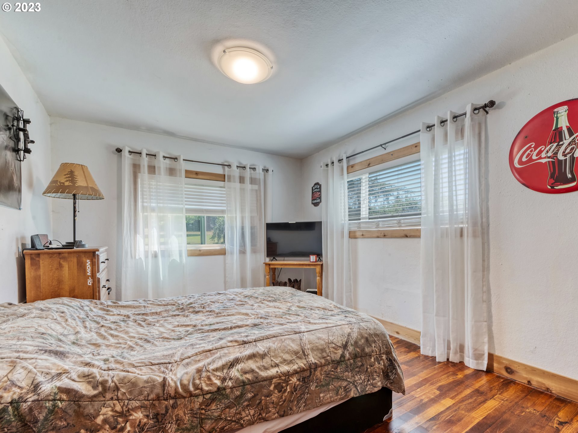 33955 Ford Mill Road Lebanon, OR 97355 - Photo 42 of 44 a bedroom with a bed and a dresser