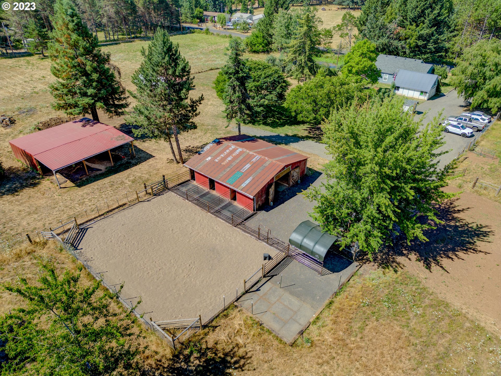 33955 Ford Mill Road Lebanon, OR 97355 - Photo 6 of 44 an aerial view of a house with a yard and lake view