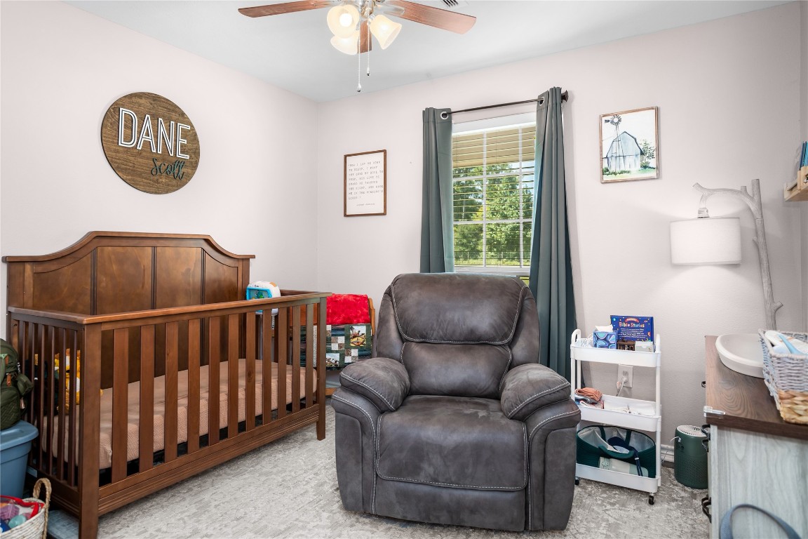 295 Garden City Road Livingston, TX 77351 - Photo 12 of 20 a bedroom with furniture and a window
