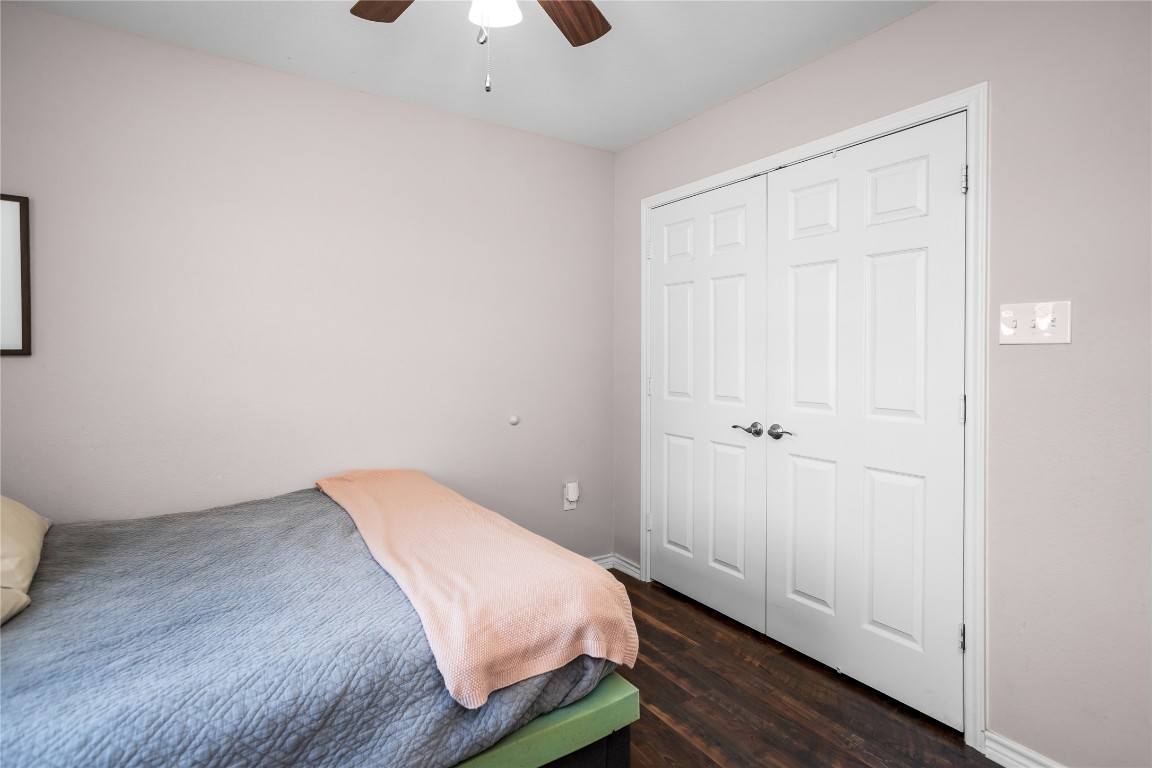 295 Garden City Road Livingston, TX 77351 - Photo 16 of 20 a bedroom with a bed and wooden floor
