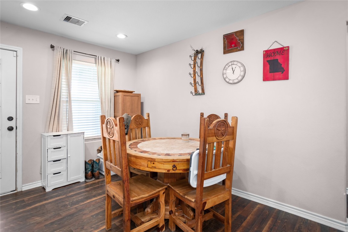 295 Garden City Road Livingston, TX 77351 - Photo 8 of 20 a dining room with furniture and wooden floor