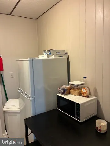 a room with furniture and a window