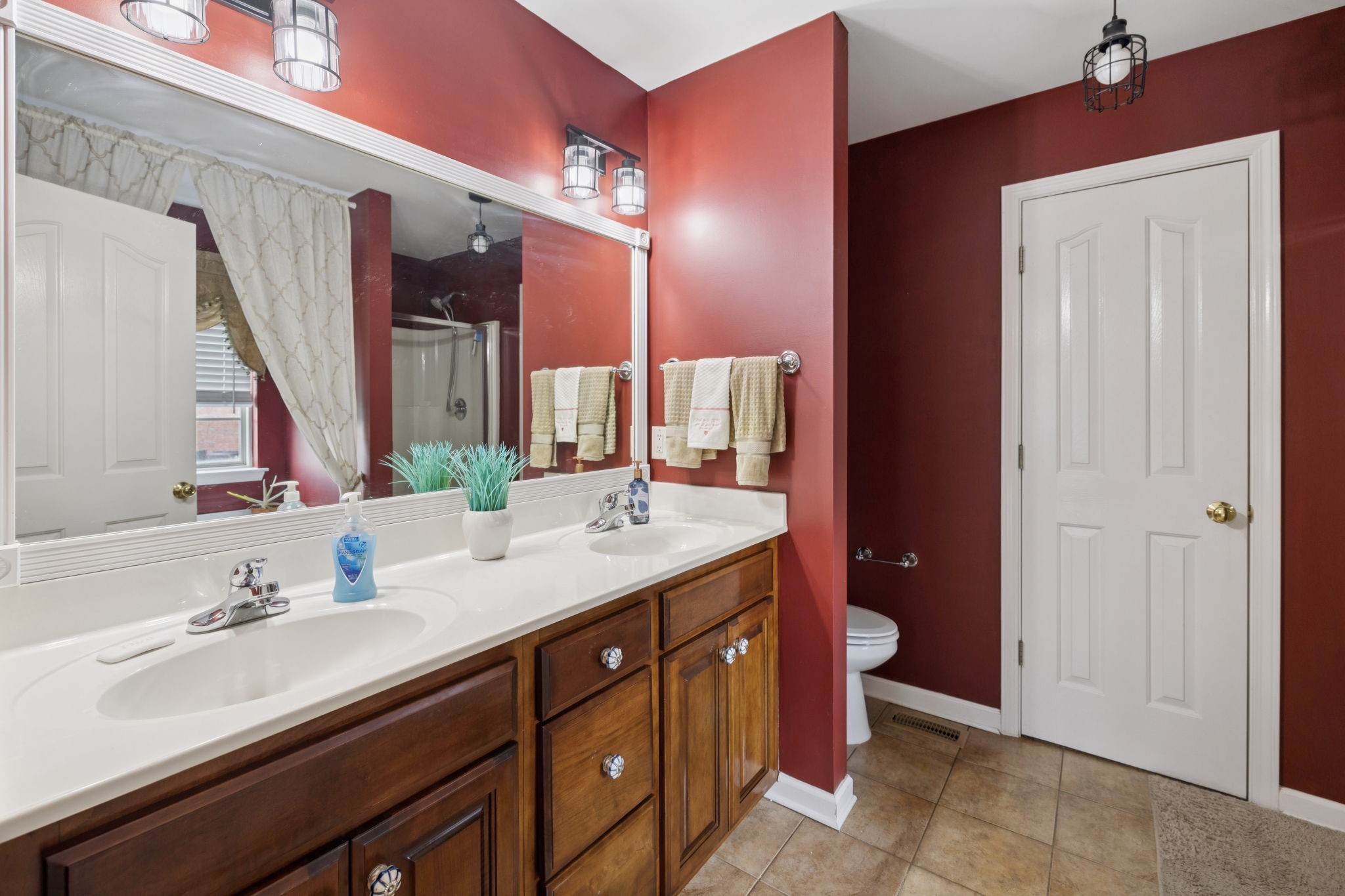114 Falling Branch Court Murfreesboro, TN 37129 - Photo 23 of 69 a bathroom with a double vanity sink and a mirror