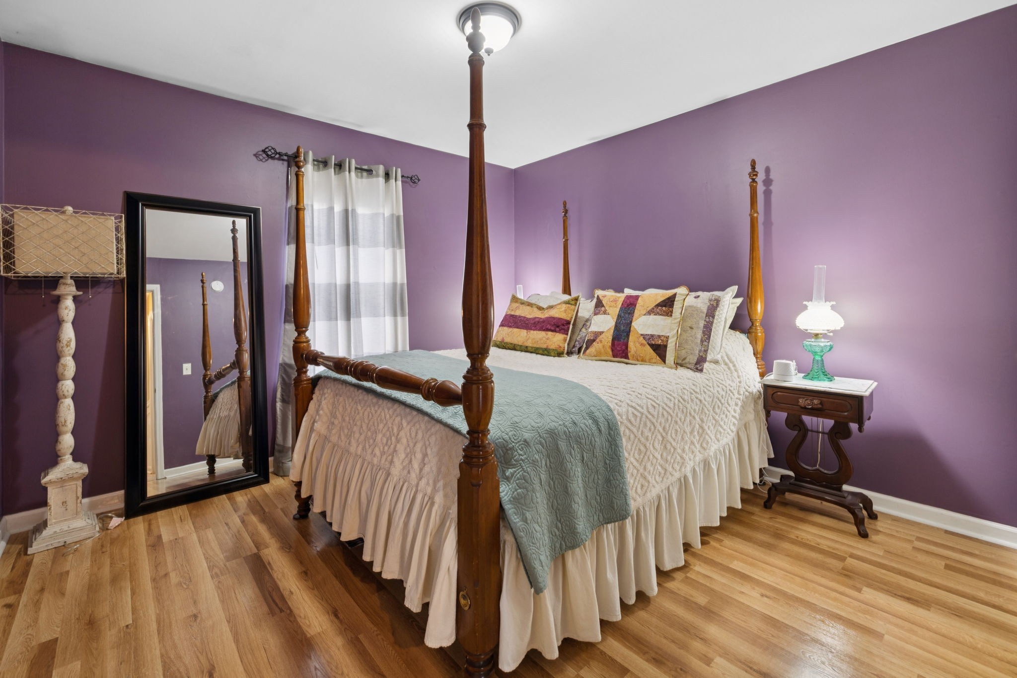 114 Falling Branch Court Murfreesboro, TN 37129 - Photo 28 of 69 a bedroom with a bed and a chandelier