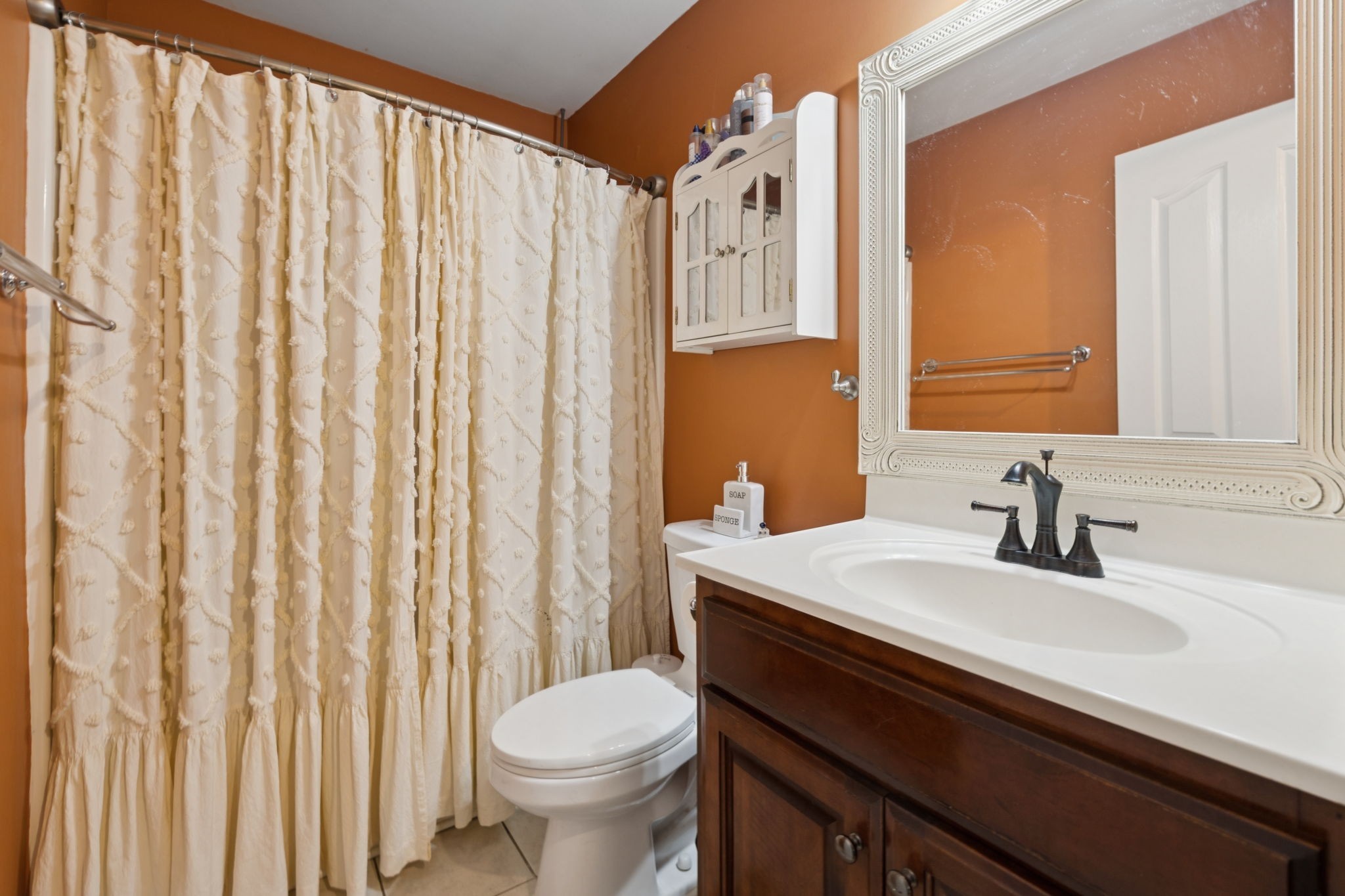 114 Falling Branch Court Murfreesboro, TN 37129 - Photo 29 of 69 a bathroom with a sink a toilet and a mirror