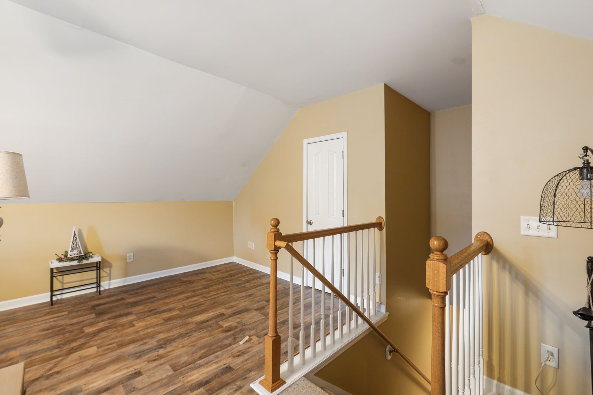 114 Falling Branch Court Murfreesboro, TN 37129 - Photo 30 of 69 a view of a hallway to a room with wooden floor and staircase