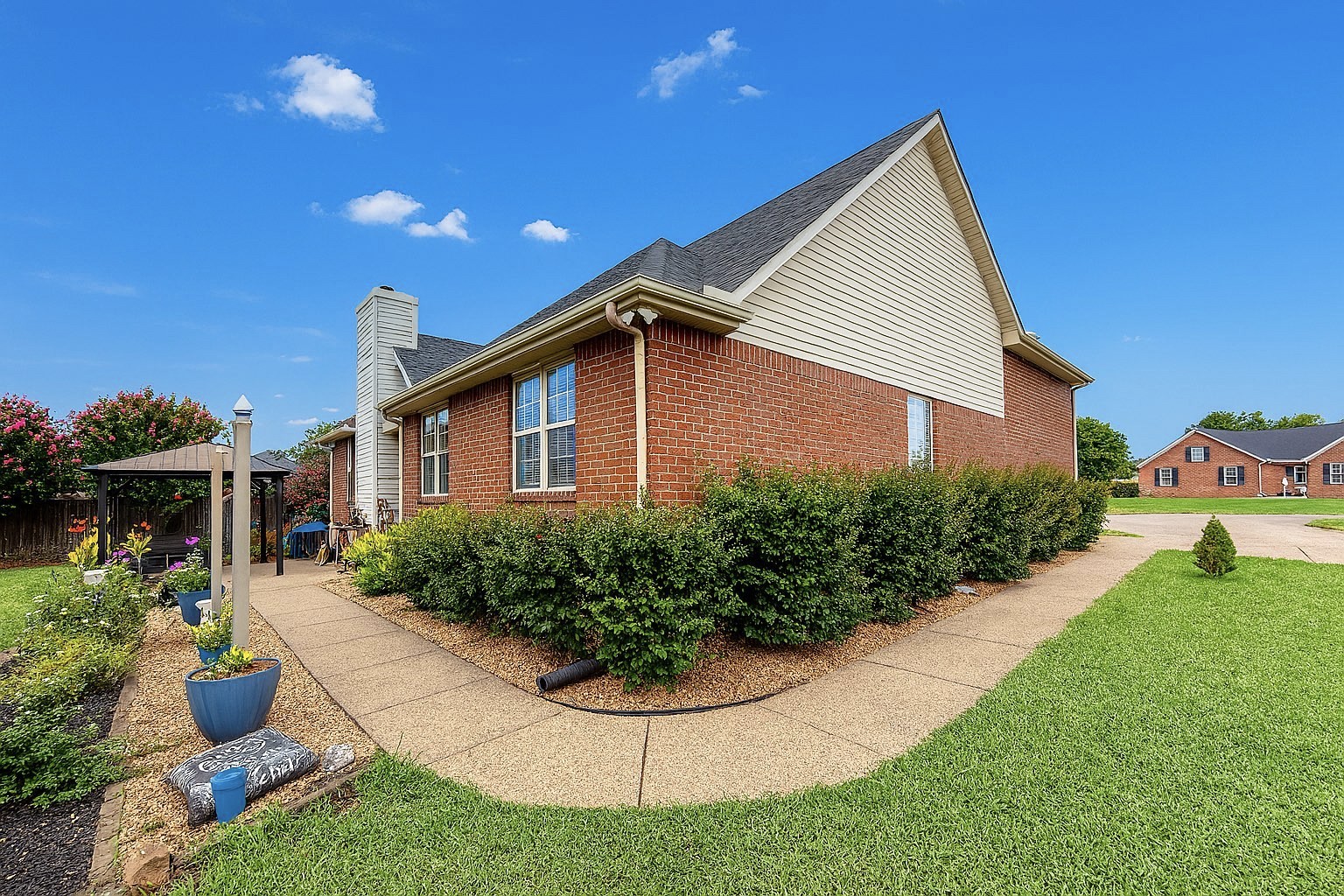 114 Falling Branch Court Murfreesboro, TN 37129 - Photo 42 of 69 a view of a house with a yard and potted plants