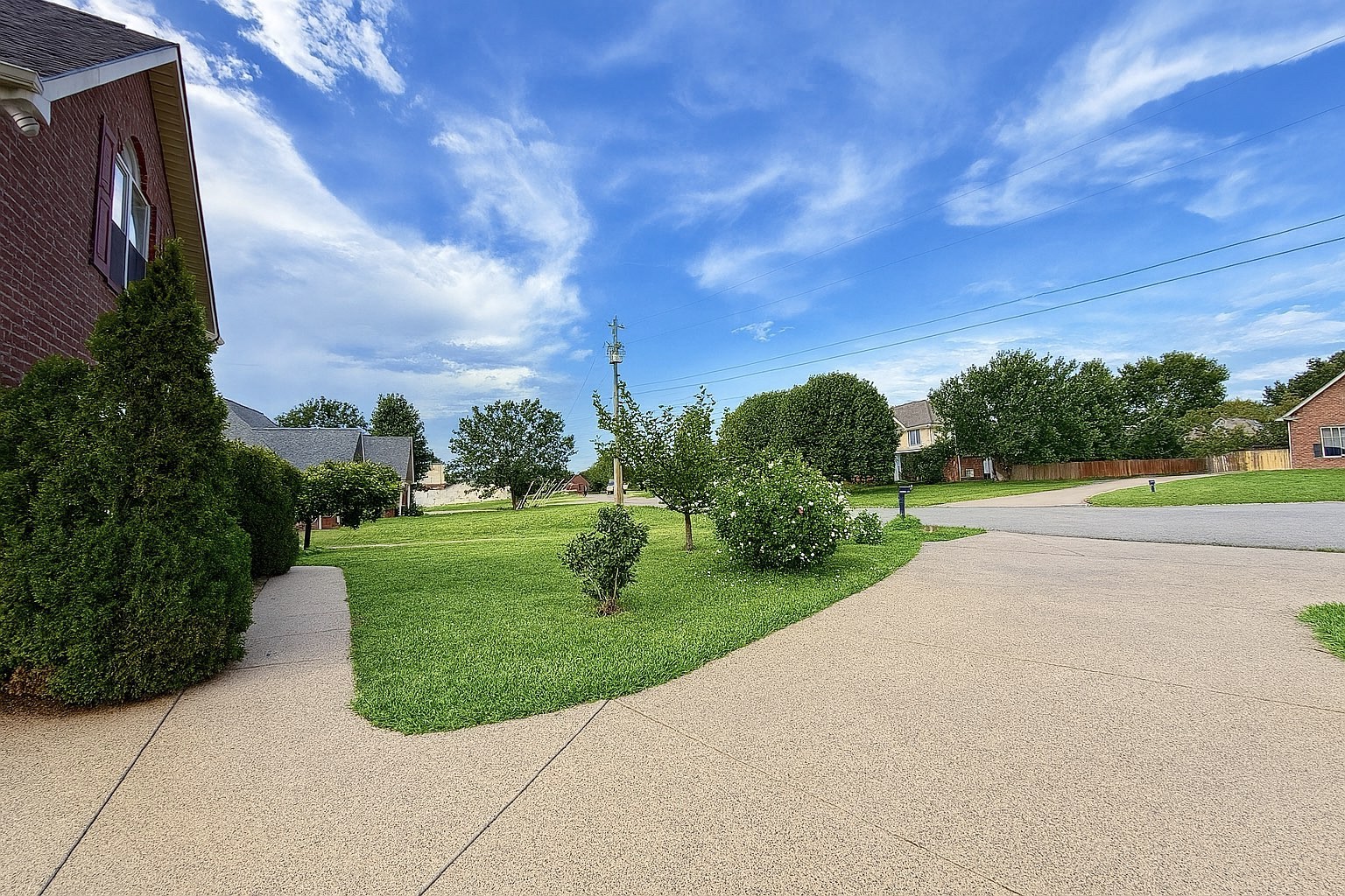114 Falling Branch Court Murfreesboro, TN 37129 - Photo 6 of 69 a view of a garden with a building in the background