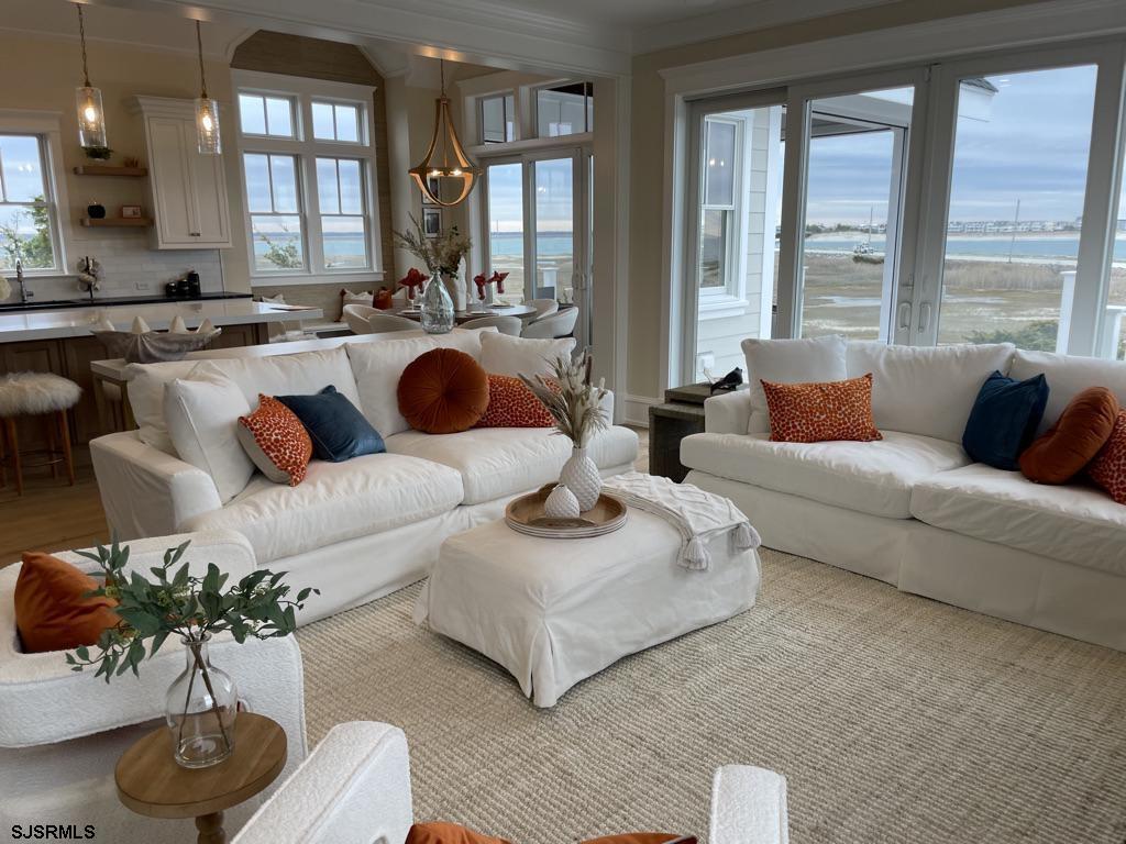 481 7th Street Avalon, NJ 08202 - Photo 14 of 51 a living room with furniture and a large window