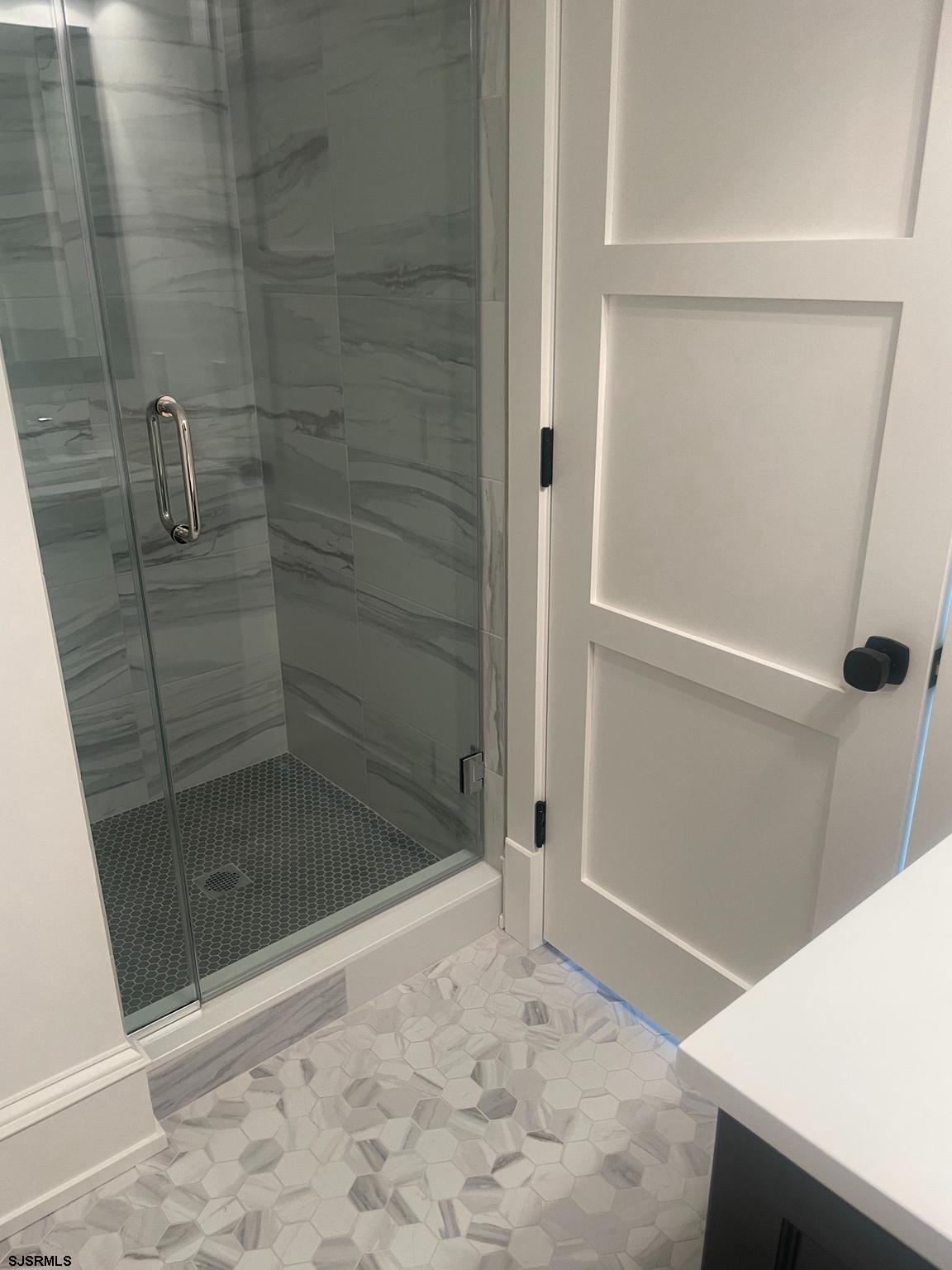 481 7th Street Avalon, NJ 08202 - Photo 26 of 51 a bathroom with a shower