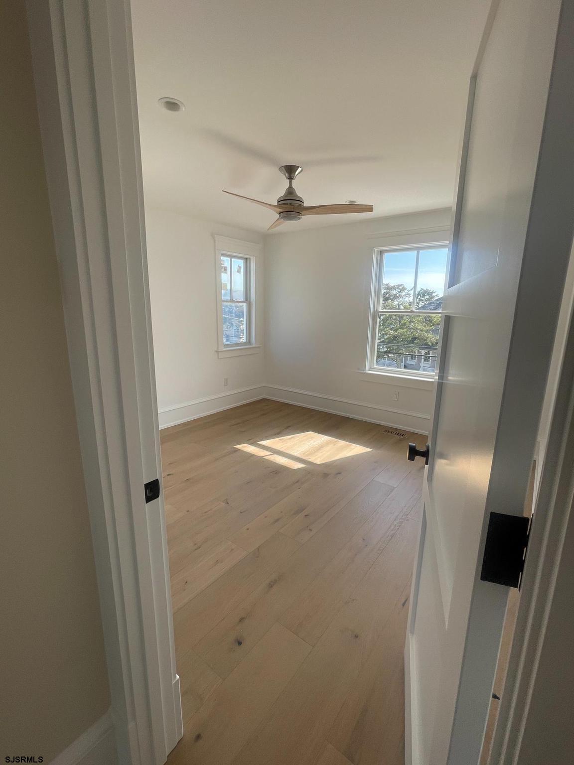 481 7th Street Avalon, NJ 08202 - Photo 28 of 51 a view of an empty room with a window