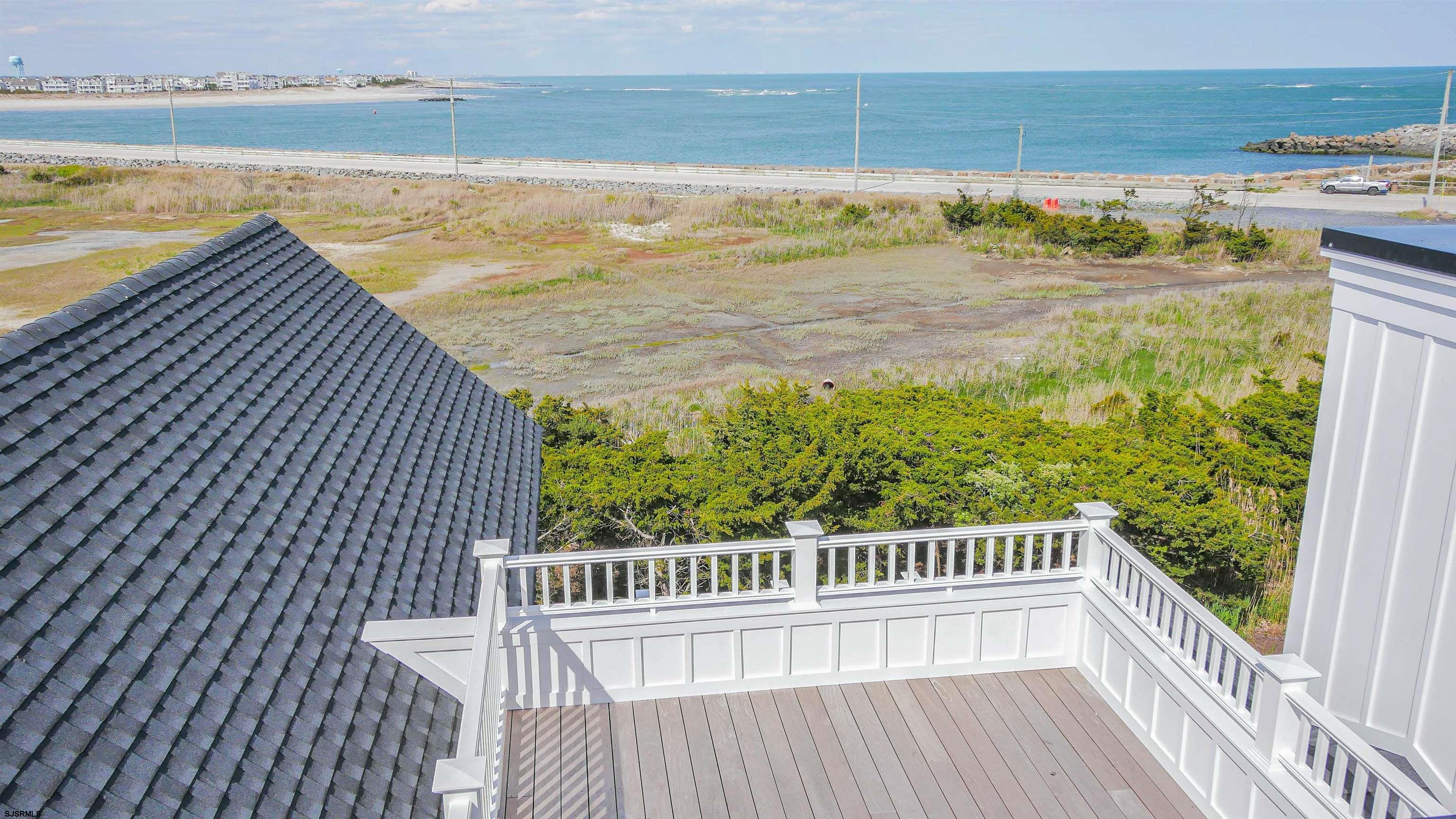 481 7th Street Avalon, NJ 08202 - Photo 32 of 51 a view of a balcony with an ocean view