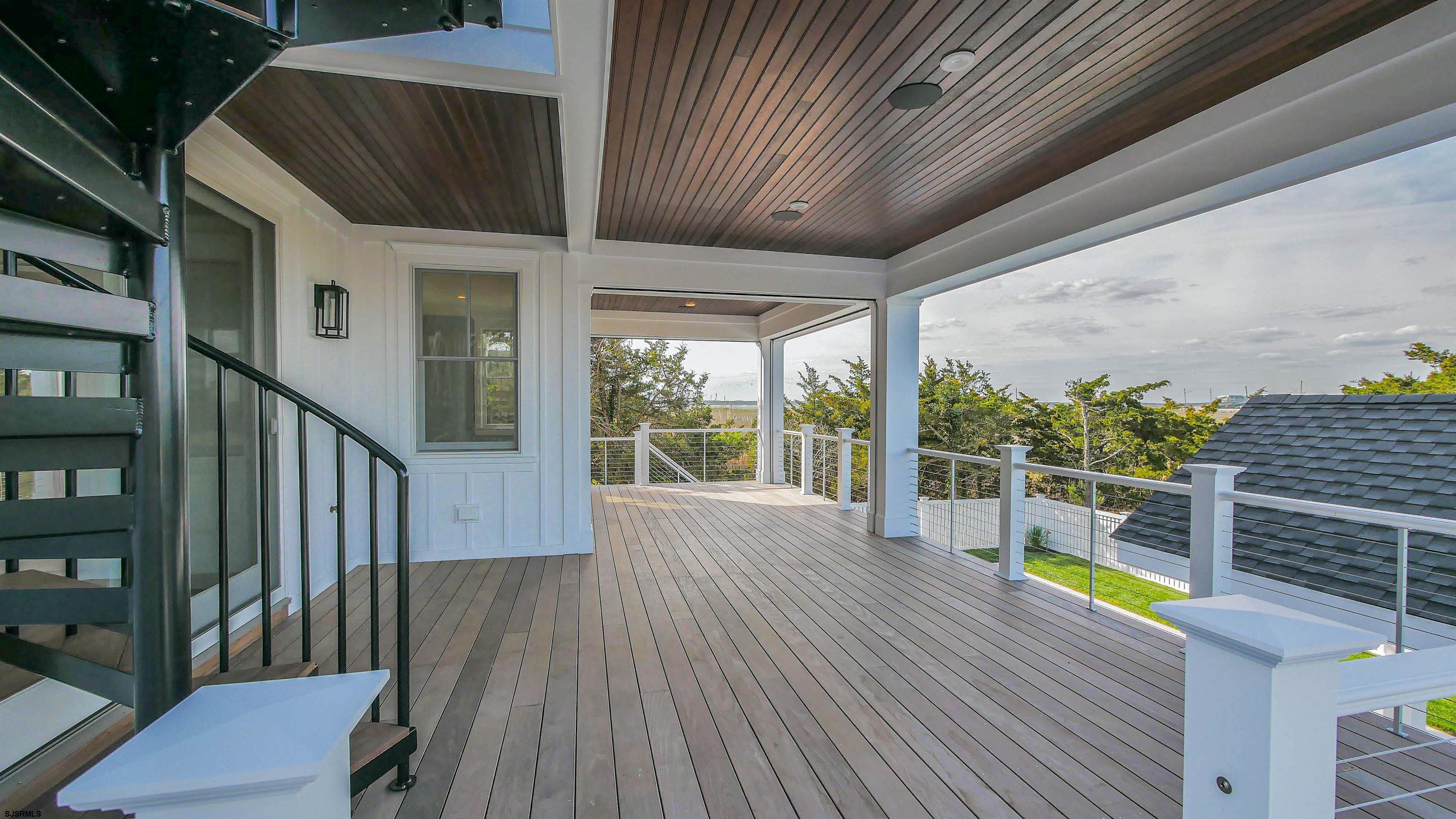 481 7th Street Avalon, NJ 08202 - Photo 43 of 51 a view of outdoor space and deck