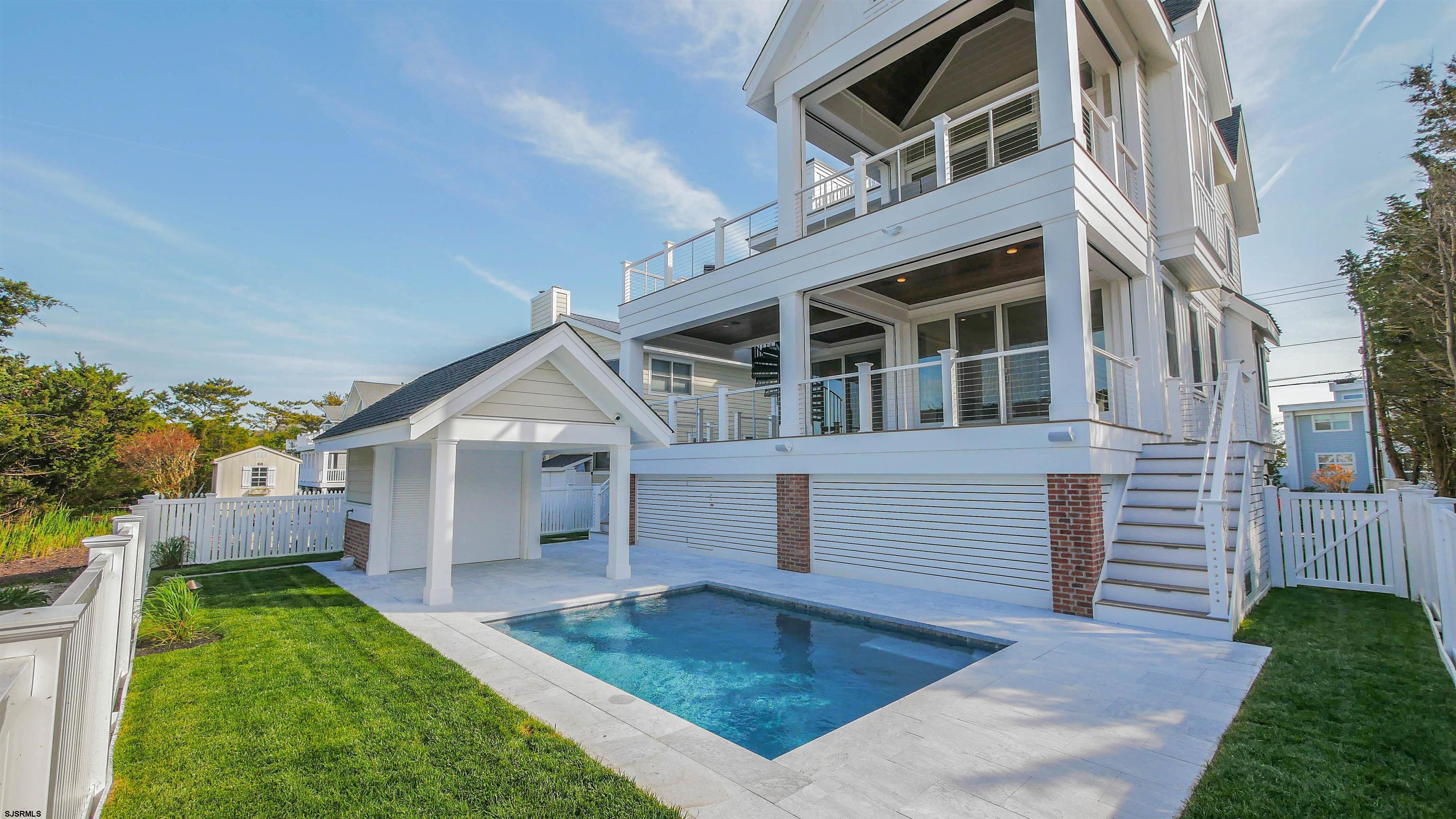 481 7th Street Avalon, NJ 08202 - Photo 45 of 51 front view of a house with a yard