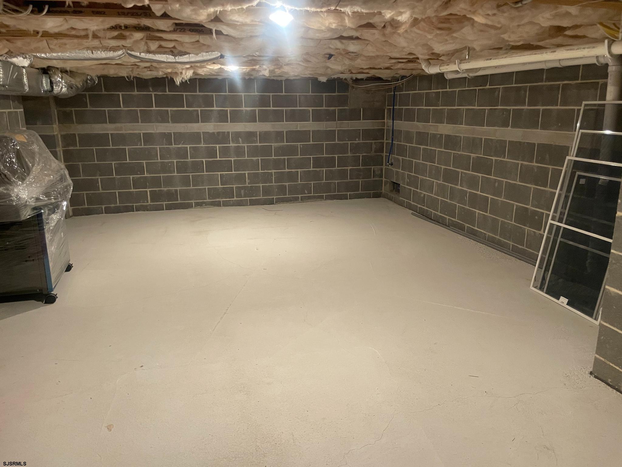 481 7th Street Avalon, NJ 08202 - Photo 50 of 51 a view of a room with racks on the wall