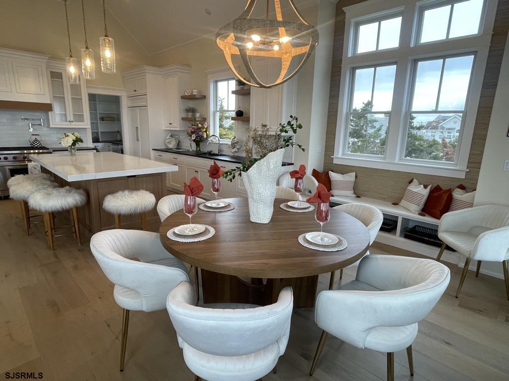 481 7th Street Avalon, NJ 08202 - Photo 9 of 51 a view of a dining room with furniture and wooden floor