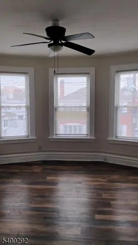 a view of room and wooden floor