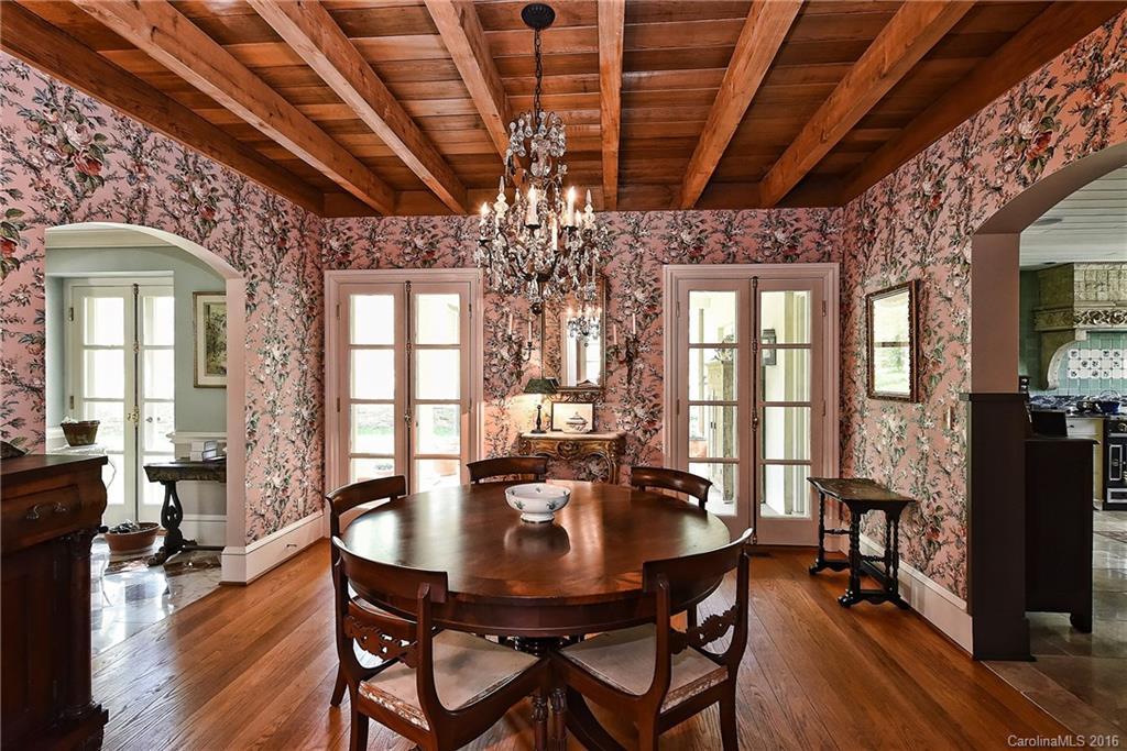 8375 Providence Road Charlotte, NC 28270 - Photo 5 of 24 a view of a dining room with furniture window and wooden floor