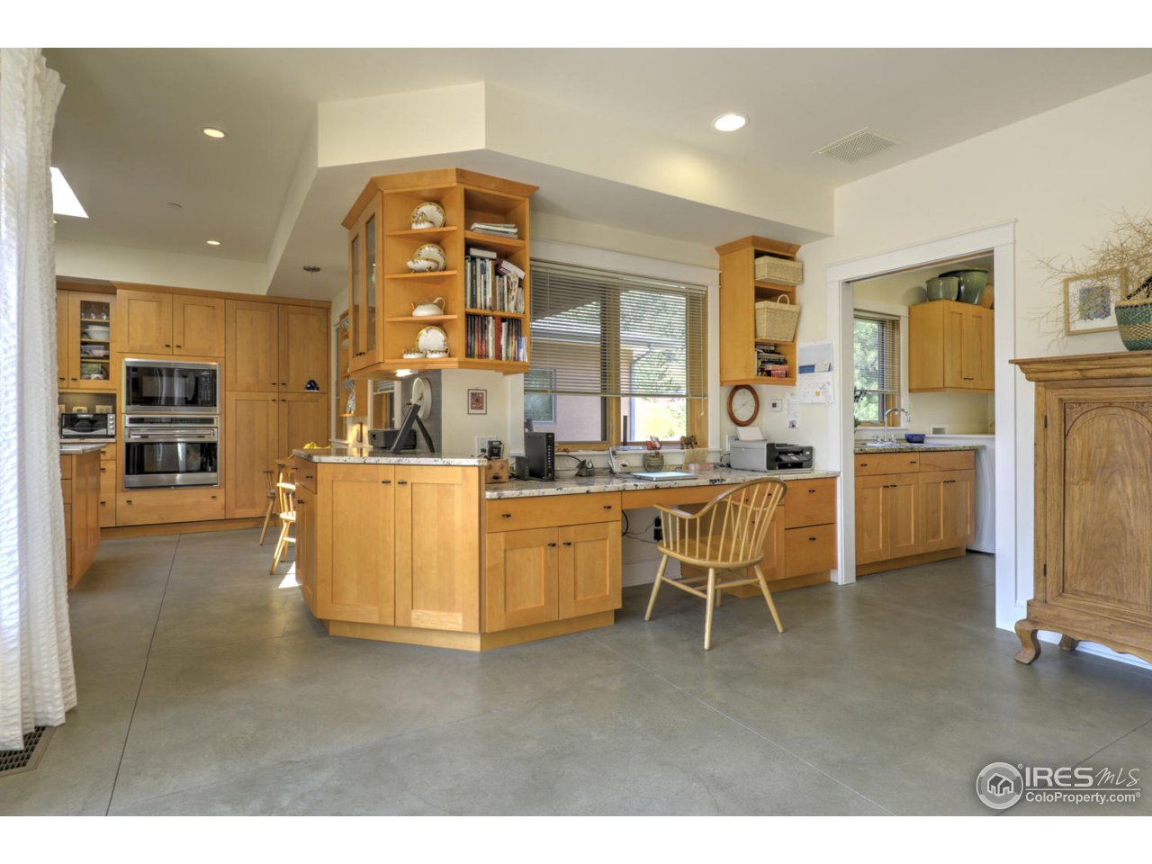 7010 Olde Stage Road Boulder, CO 80302 - Photo 11 of 31 a living room with furniture a dining table and kitchen view