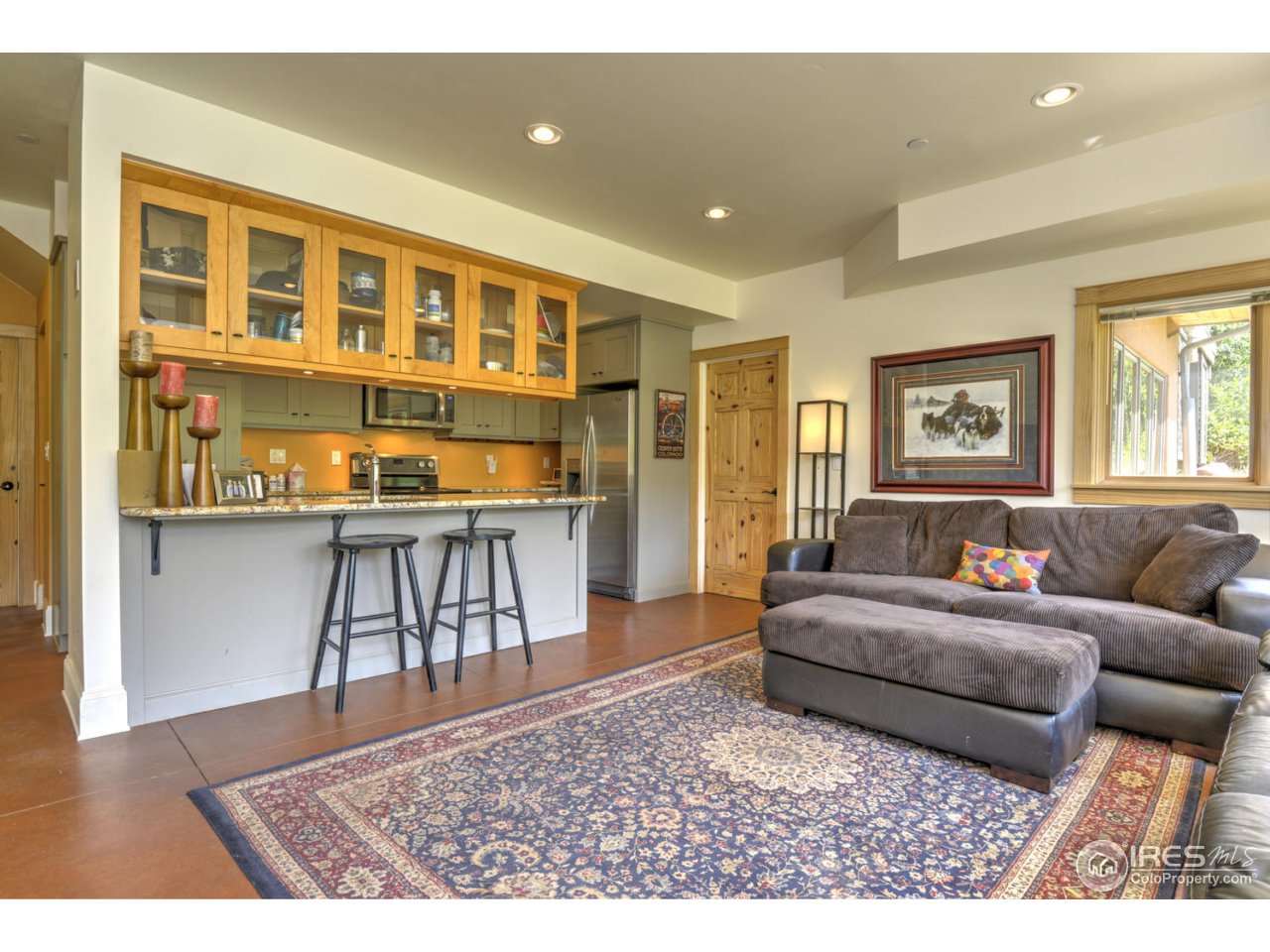 7010 Olde Stage Road Boulder, CO 80302 - Photo 21 of 31 a living room with a bed furniture and a window