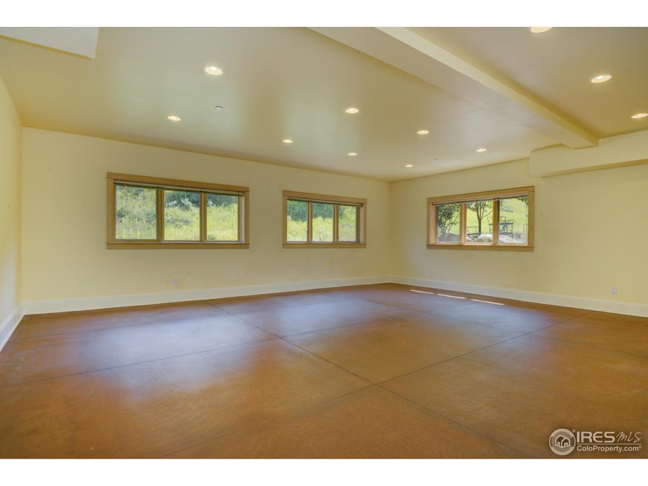 7010 Olde Stage Road Boulder, CO 80302 - Photo 25 of 31 a view of an empty room with window and wooden floor
