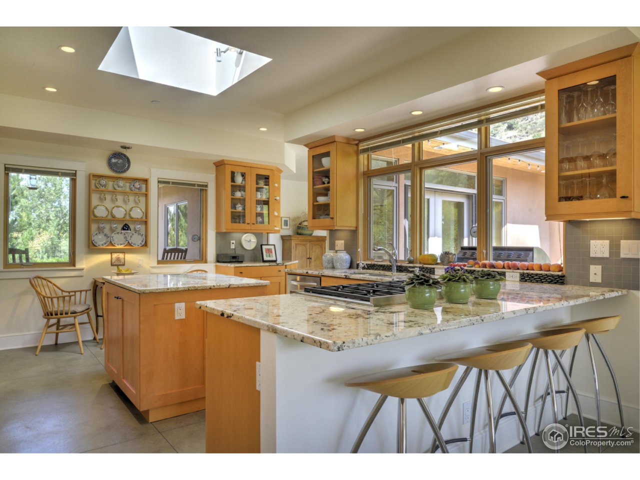 7010 Olde Stage Road Boulder, CO 80302 - Photo 8 of 31 a dining hall with stainless steel appliances granite countertop a granite counter tops and a large window