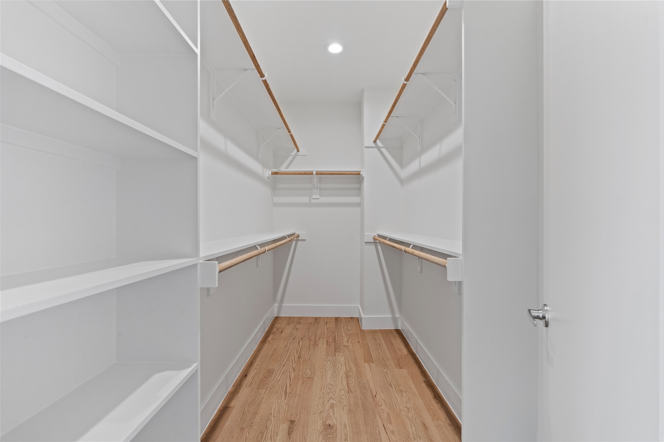 1810 Yates Street Houston, TX 77020 - Photo 22 of 30 2 spacious walk-in closet with built-in shelving & ample hanging space for both him and her. Designed to keep your wardrobe organized & easily accessible.