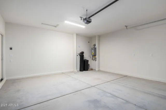 a view of a backyard with a garden and plants