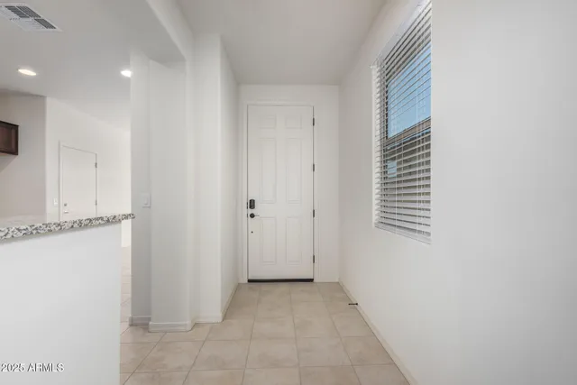 a view of a hallway with closet