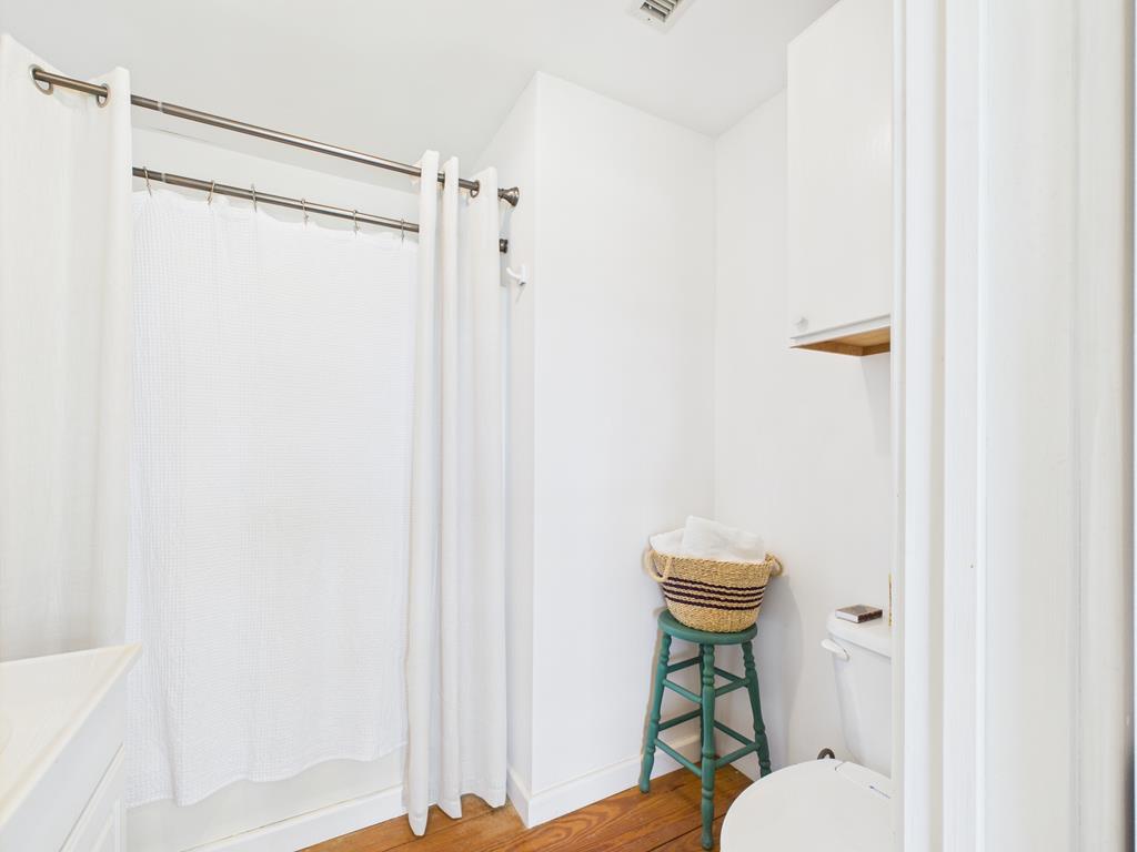 289 Kc 474 Harper, TX 78631 - Photo 15 of 27 a bathroom with a toilet and a shower