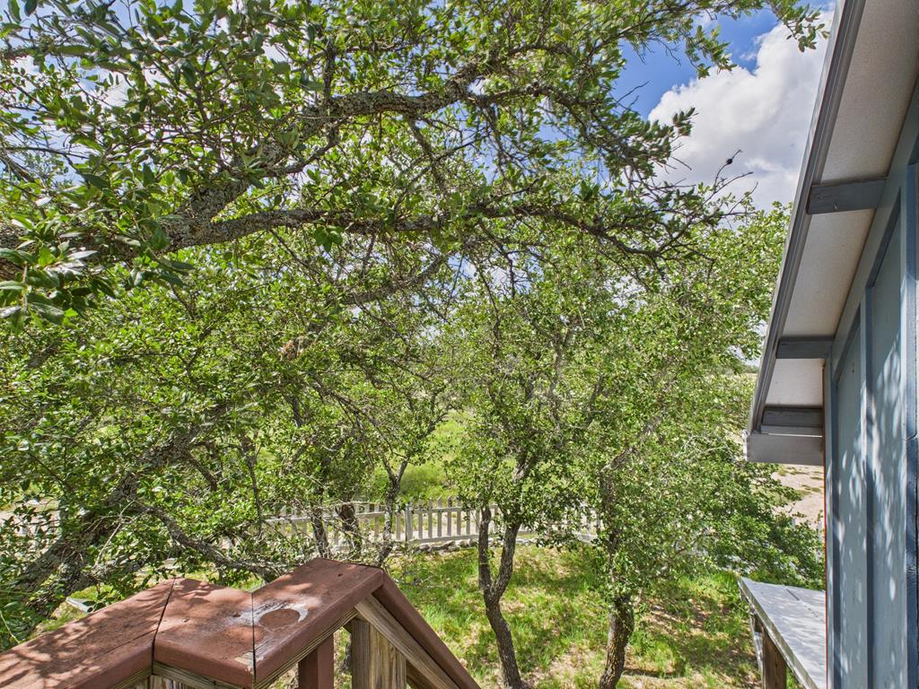289 Kc 474 Harper, TX 78631 - Photo 21 of 27 a view of a yard from a balcony