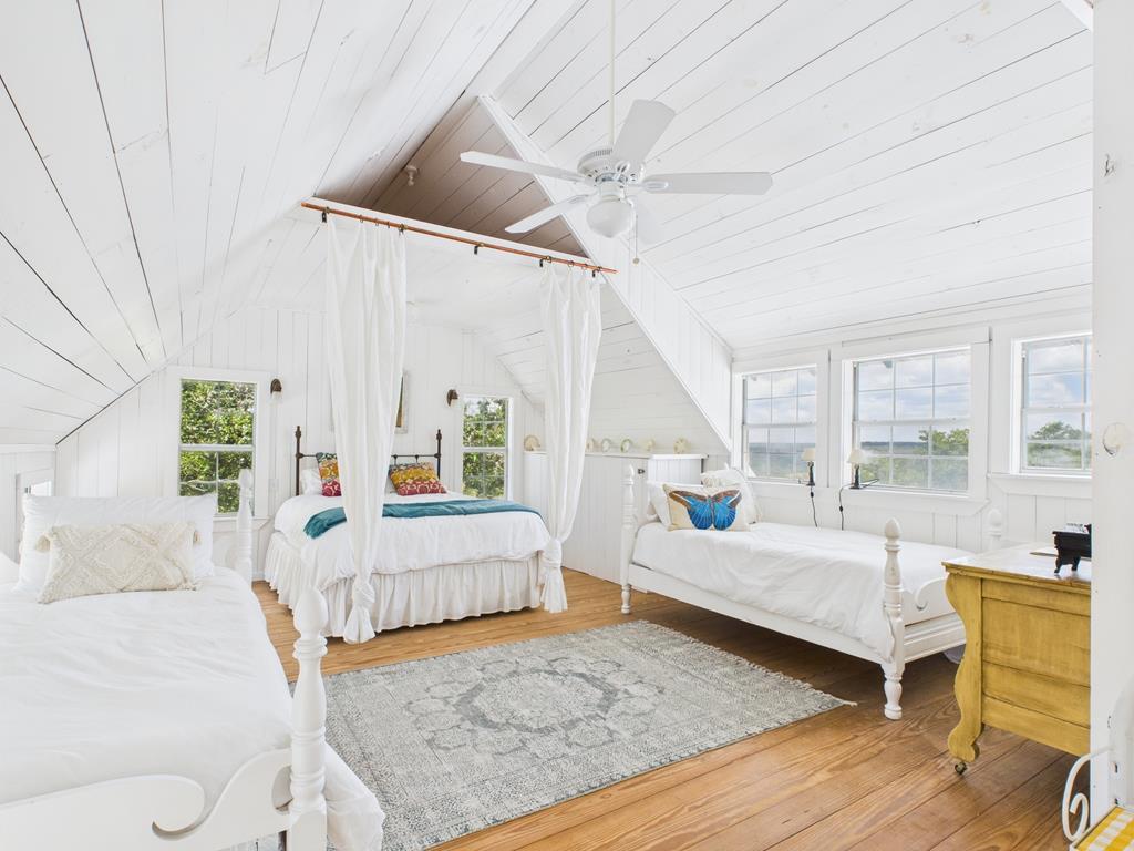 289 Kc 474 Harper, TX 78631 - Photo 25 of 27 a bedroom with furniture and a large window