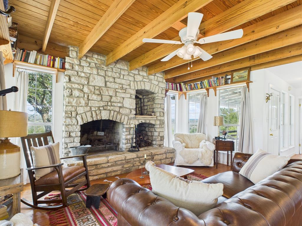 289 Kc 474 Harper, TX 78631 - Photo 3 of 27 a living room with furniture and a fireplace