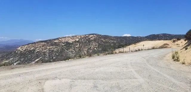 a view of mountain view with mountains in the background