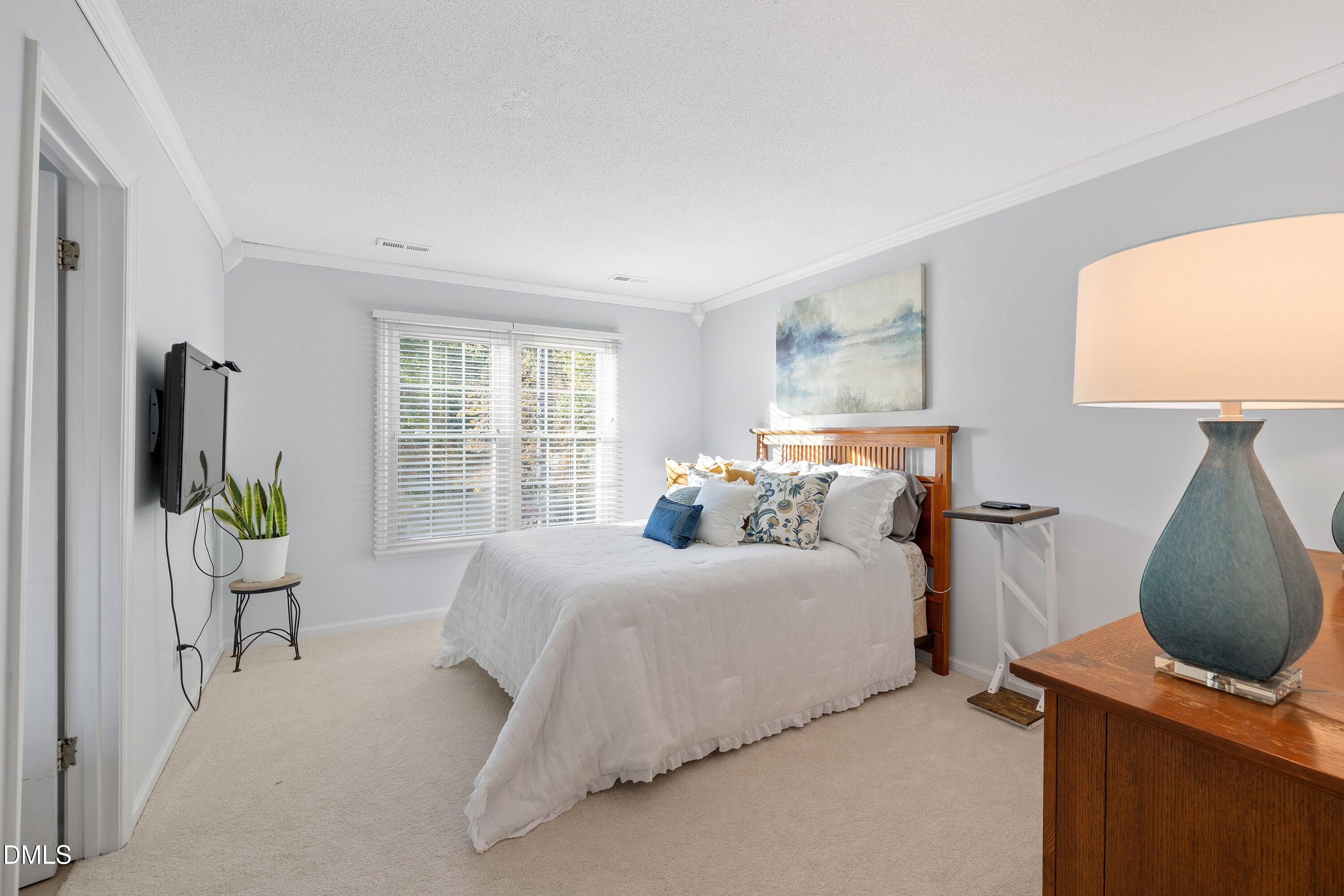 232 Wetherburn Lane Raleigh, NC 27615 - Photo 13 of 30 Primary Bedroom