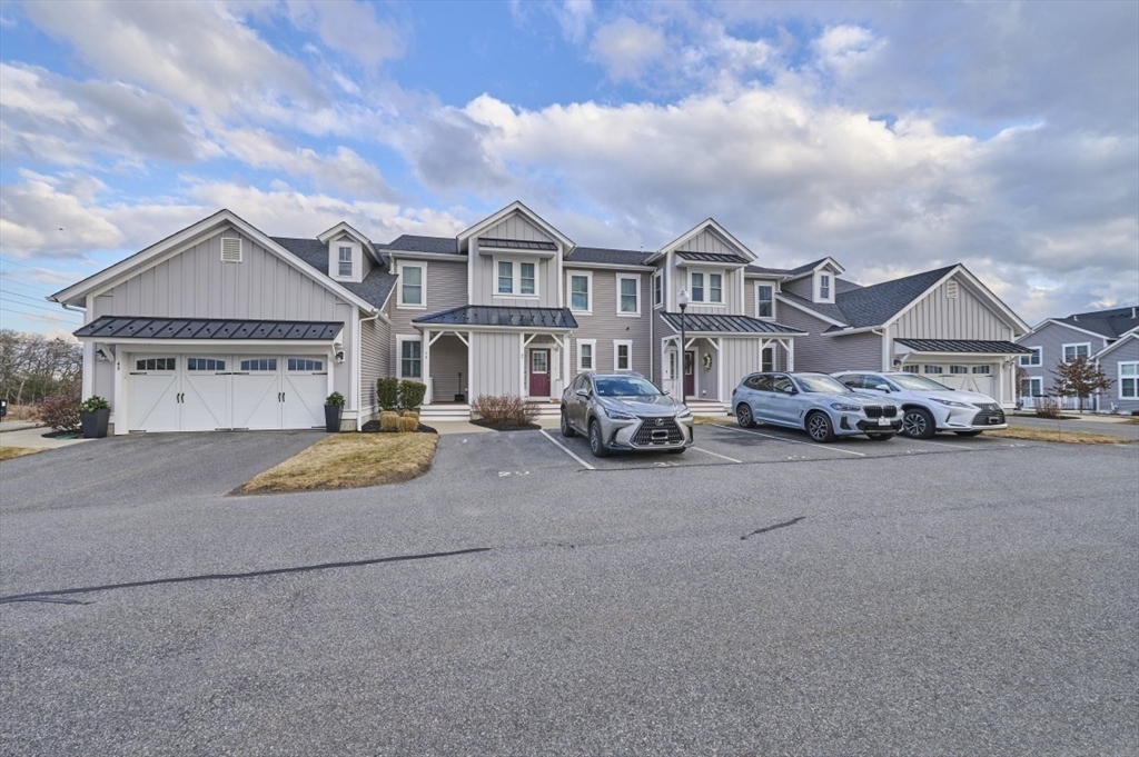 299 Lexington Street, Unit 51 Woburn, MA 01801 - Photo 22 of 37 a view of multiple houses with a street