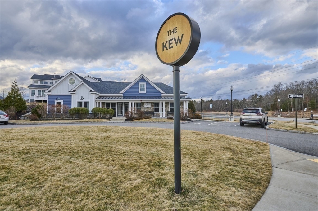 299 Lexington Street, Unit 51 Woburn, MA 01801 - Photo 25 of 37 a front view of a house with garden