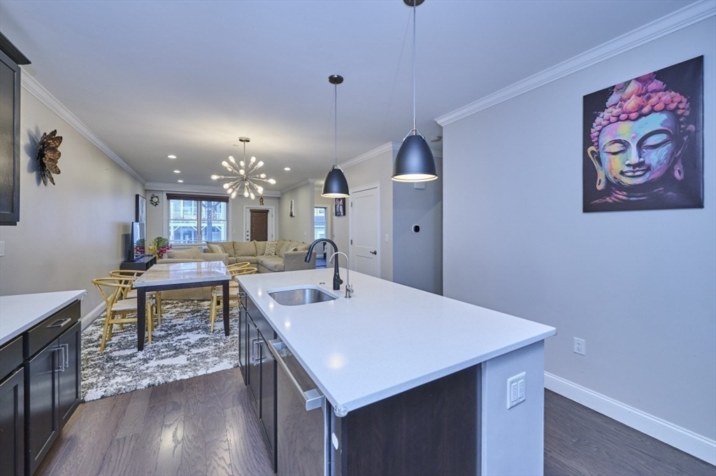 299 Lexington Street, Unit 51 Woburn, MA 01801 - Photo 3 of 37 a view of a kitchen area