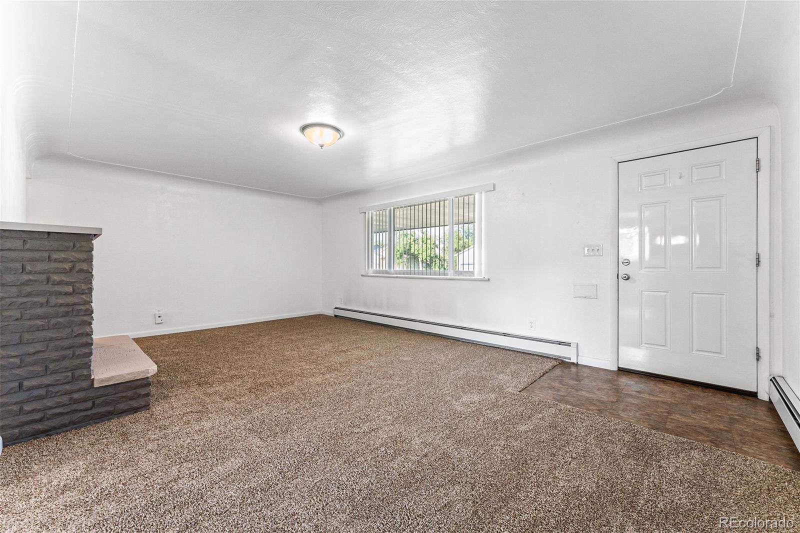 3709 Allison Street Wheat Ridge, CO 80033 - Photo 33 of 44 an empty room with windows