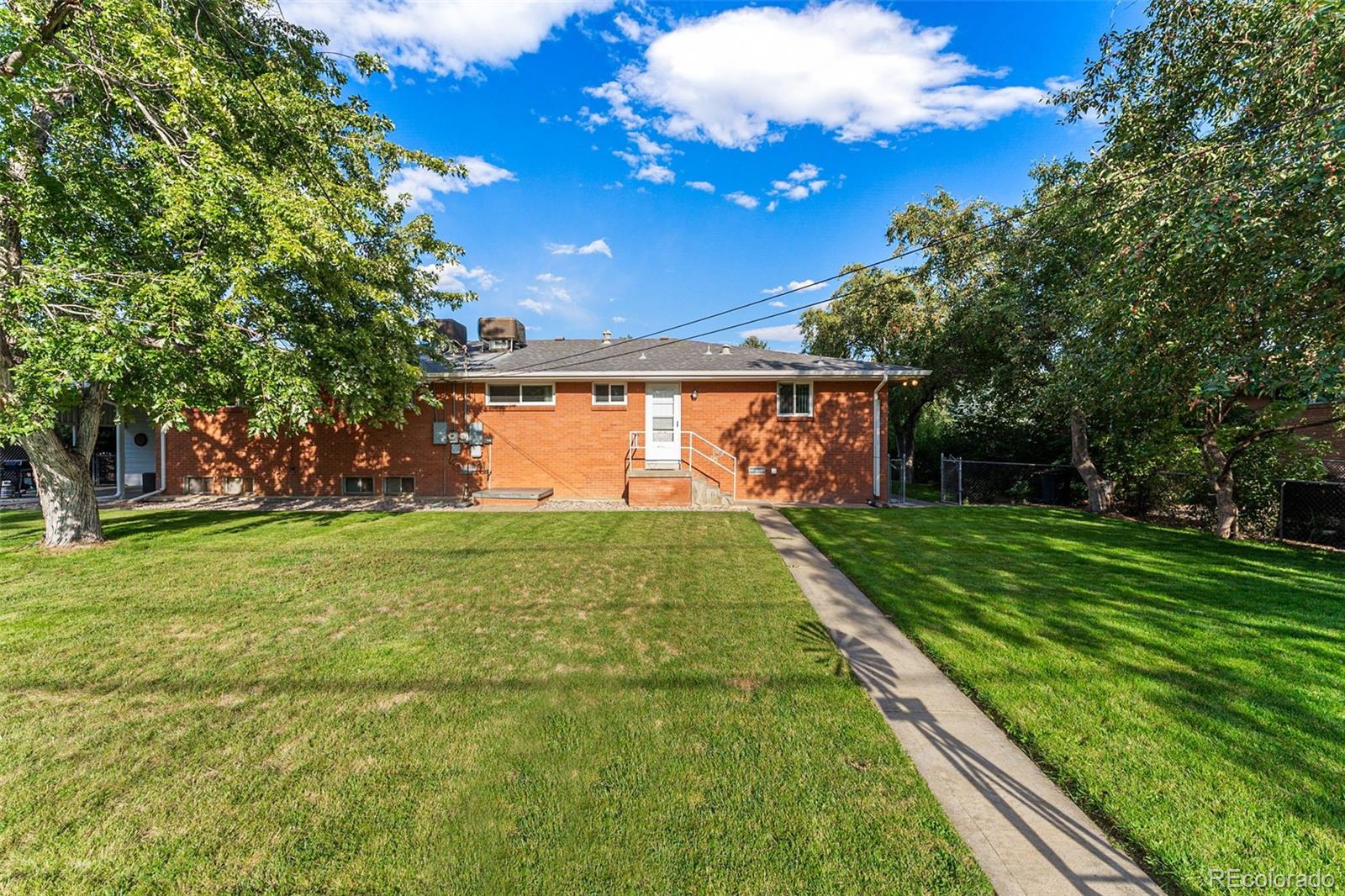 3709 Allison Street Wheat Ridge, CO 80033 - Photo 38 of 44 a view of an outdoor space and yard