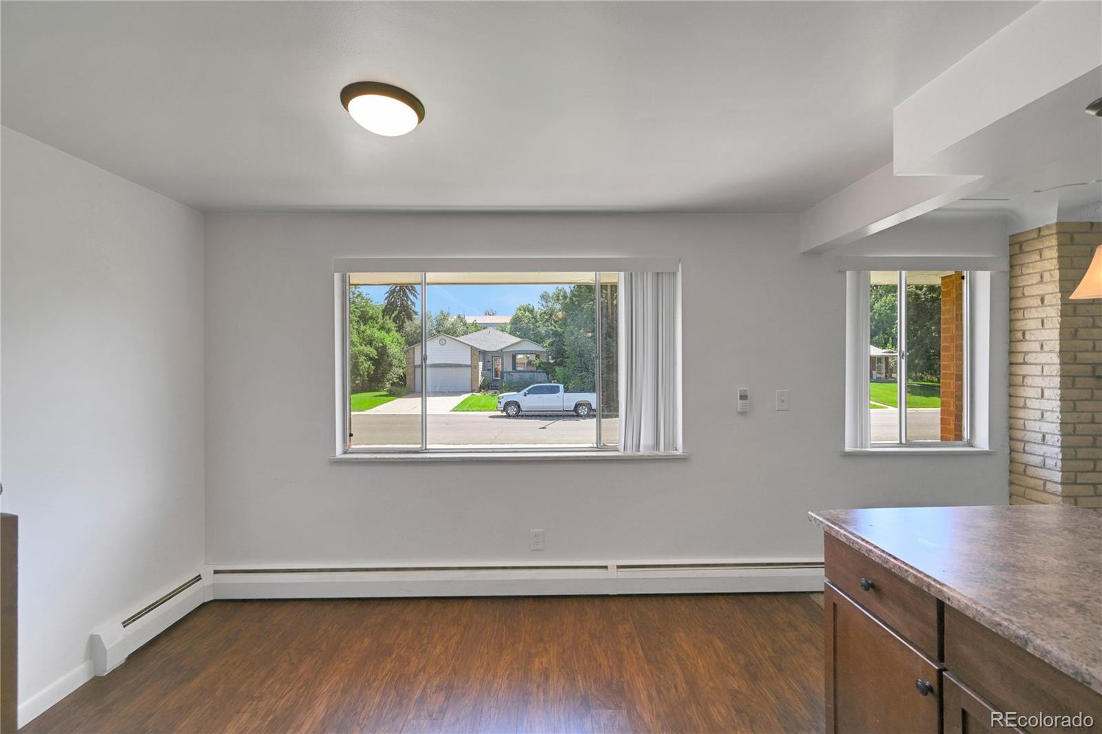 3709 Allison Street Wheat Ridge, CO 80033 - Photo 9 of 44 an empty room with a window
