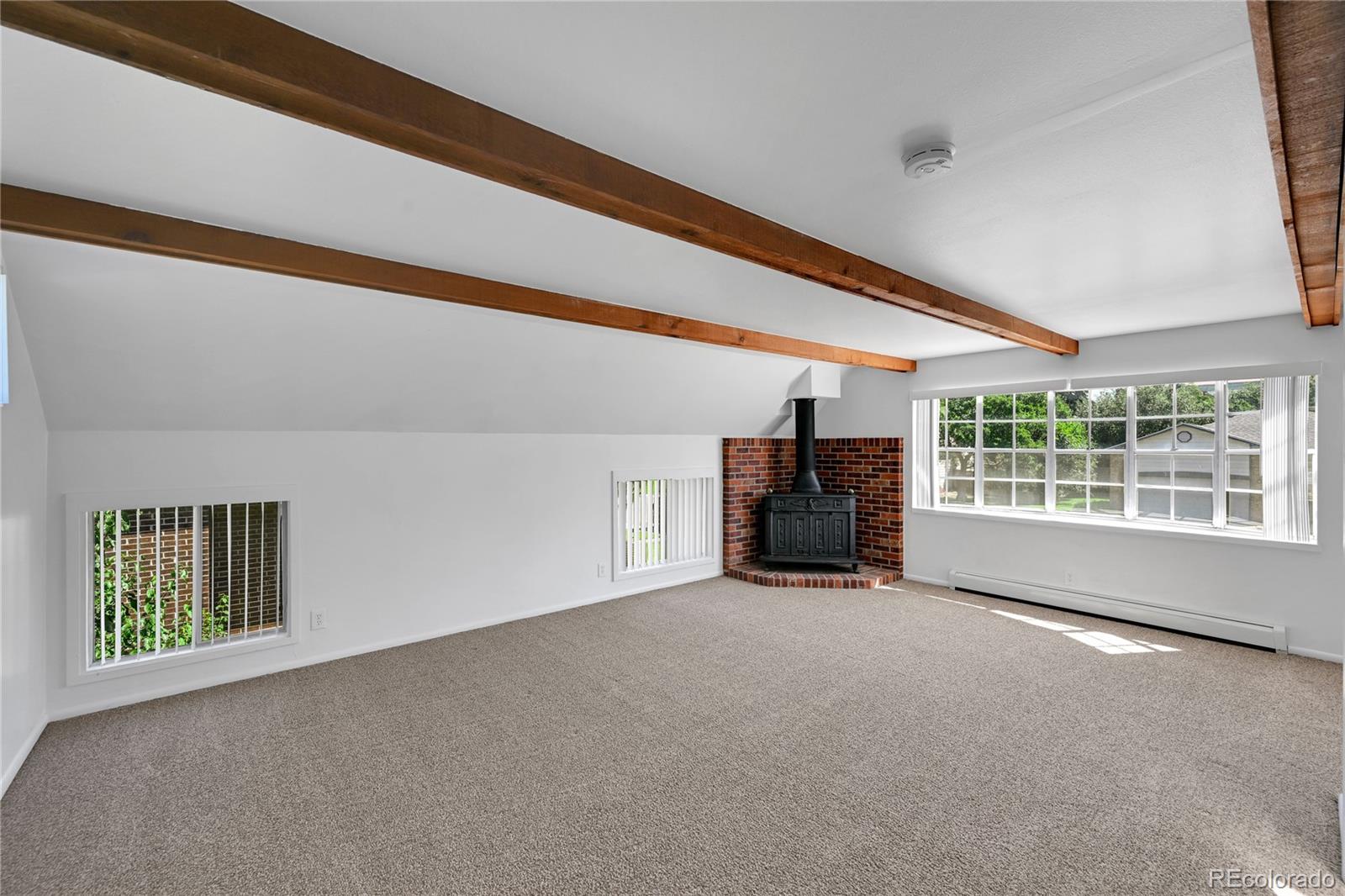 3709 Allison Street Wheat Ridge, CO 80033 - Photo 10 of 44 a view of an empty room with a window